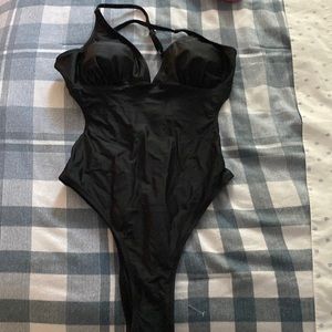 Brand new never worn black one piece